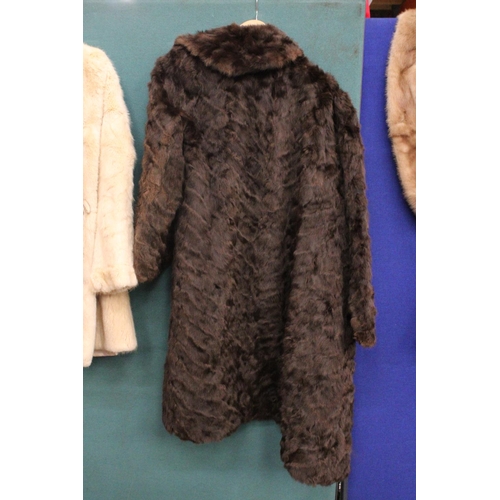 87 - A BROWN FUR COAT