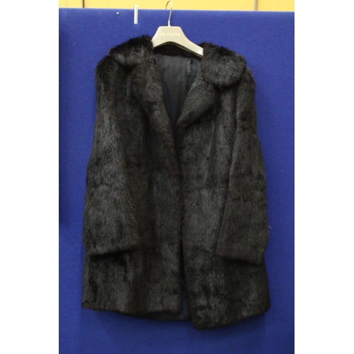 89 - A DARK BROWN FUR COAT