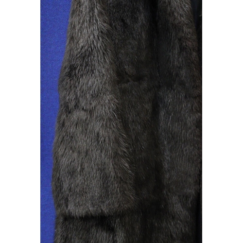 89 - A DARK BROWN FUR COAT