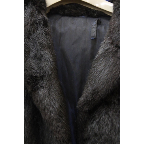 89 - A DARK BROWN FUR COAT