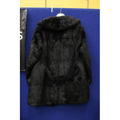 89 - A DARK BROWN FUR COAT