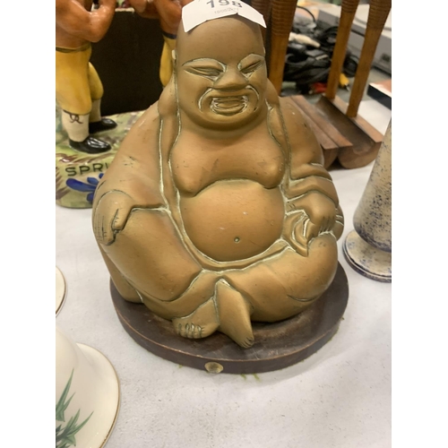 198 - A BRASS BUDDHA ON STAND