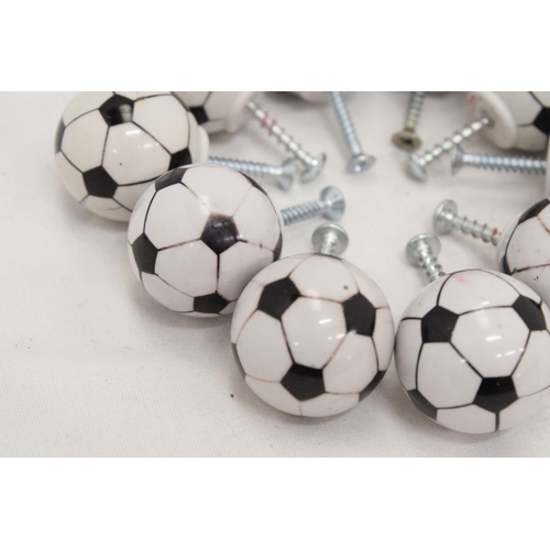 233 - A 1930'S EMBROIDED BADGE PLUS TEN FIFA FOOTBALL DRAWER KNOBS