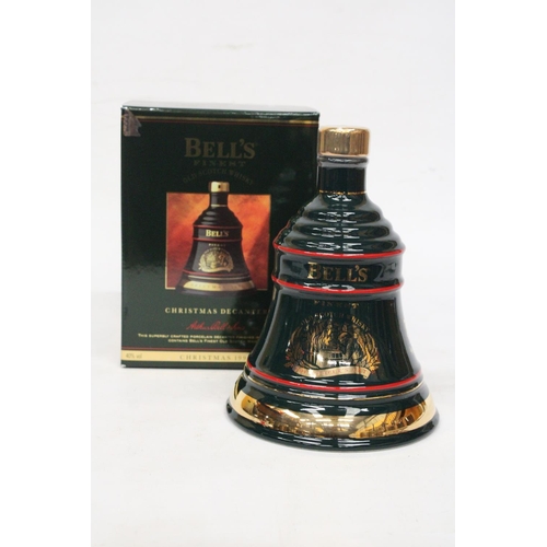 308 - A SEALED BELL'S FINEST OLD SCOTCH WHISKY IN A CHRISTMAS 1992 PORCELAIN DECANTER FINISHED IN 22 CARAT... 