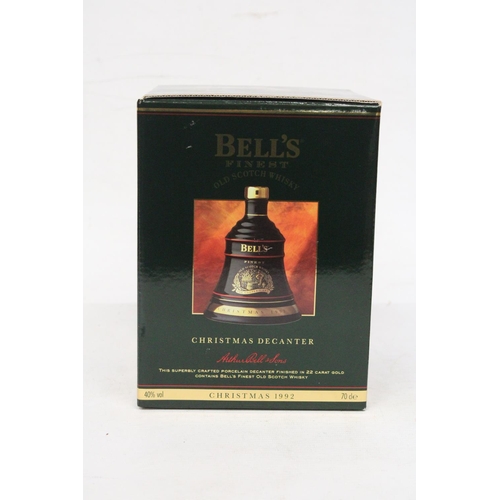 308 - A SEALED BELL'S FINEST OLD SCOTCH WHISKY IN A CHRISTMAS 1992 PORCELAIN DECANTER FINISHED IN 22 CARAT... 