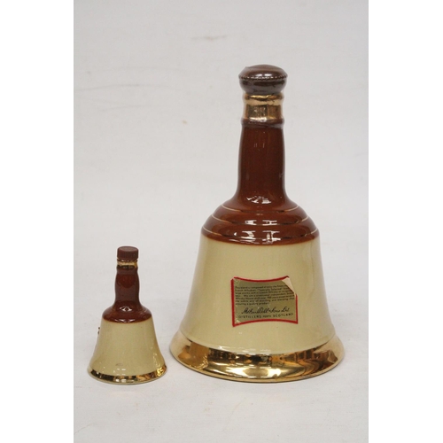 310 - TWO BELL'S BLENDED SCOTCH WHISKY 75 CL AND A MINIATURE IN DECANTERS