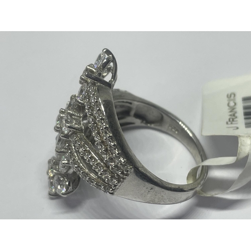 515 - A MARKED 925 SILVER RING WITH SWAROVSKI ZIRCONIAS SIZE Q IN A PRESENTATION BOX