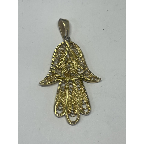 528 - A GOLD PLATED HAMSA HAND PENDANT