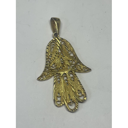 528 - A GOLD PLATED HAMSA HAND PENDANT