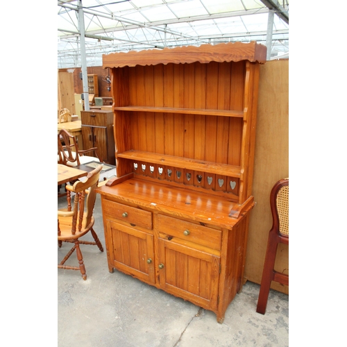 2818 - A PINE DRESSER WITH PLATE RACK, 46.5