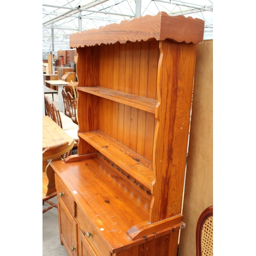 2818 - A PINE DRESSER WITH PLATE RACK, 46.5