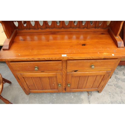 2818 - A PINE DRESSER WITH PLATE RACK, 46.5