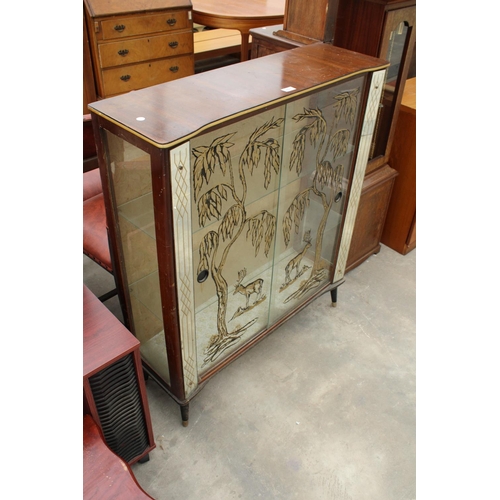 2827 - A MID 20TH CENTURY TWO DOOR GLAZED CHINA CABINET WITH PAINTED DEER AND TREES TO DOORS, MAGAZINE RACK... 