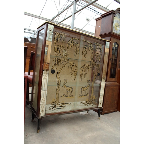 2827 - A MID 20TH CENTURY TWO DOOR GLAZED CHINA CABINET WITH PAINTED DEER AND TREES TO DOORS, MAGAZINE RACK... 