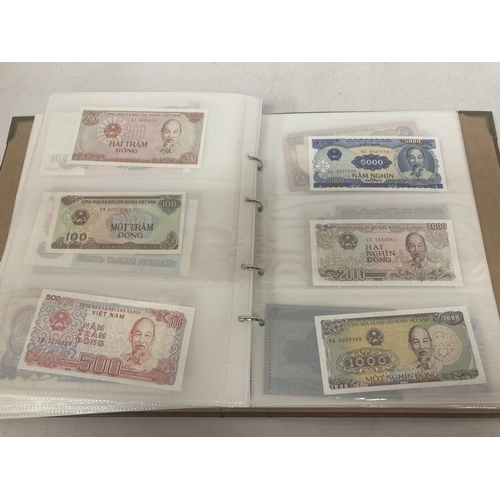 306 - A FOLDER CONTAINING IN EXCESS OF 160 VINTAGE WORLD BANK NOTES TO INCLUDE BANK OF INDONESIA RUPIAH, U... 