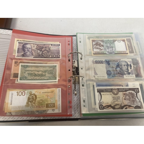 323 - AN ALBUM CONTAINING 69 DOUBLE SIDED WALLETS OF VINTAGE WORLD BANK NOTES TO INCLUDE CAMBODIAN BANK NO... 