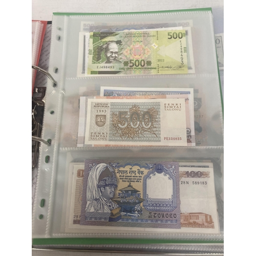 323 - AN ALBUM CONTAINING 69 DOUBLE SIDED WALLETS OF VINTAGE WORLD BANK NOTES TO INCLUDE CAMBODIAN BANK NO... 