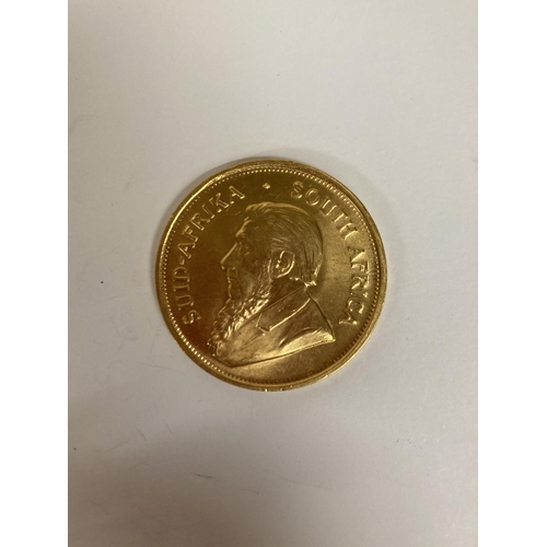 261 - A 1975 1OZ GOLD KRUGERRAND COIN