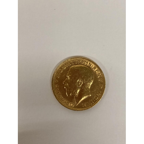 266 - A 1911 GOLD FULL SOVEREIGN COIN