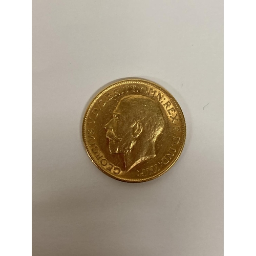 267 - A 1911 GOLD FULL SOVEREIGN COIN