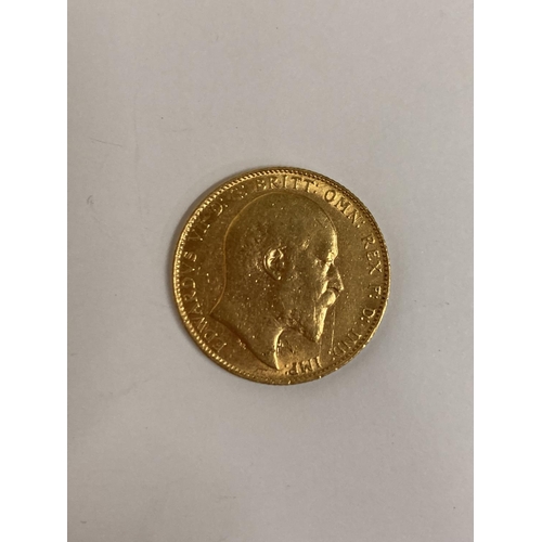 293 - A 1910 GOLD FULL SOVEREIGN COIN