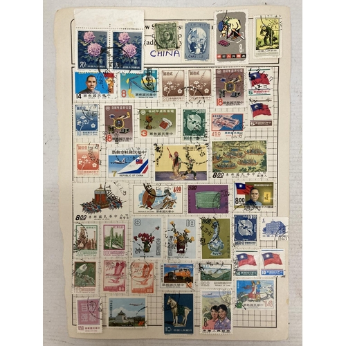 473 - TEN PAGES OF CHINESE STAMPS