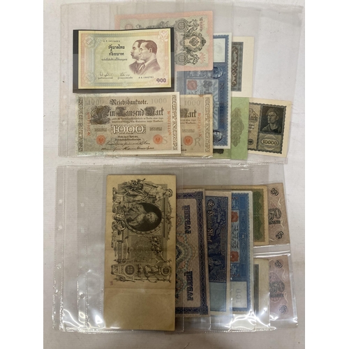 348 - AN ALBUM OF VINTAGE WORLD BANK NOTES TO INCLUDE A 1910 100 R RUBLI IMPERIAL BANK NOTE, RUSSIA 1000 R... 