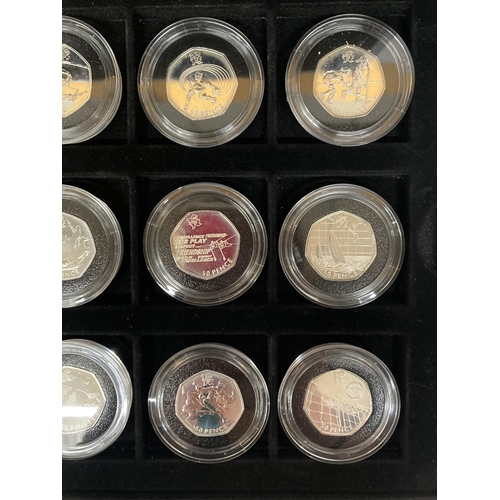 350 - A MAHOGANY COIN BOX CONTAINING TWELVE ROYAL MINT 2012 OLYMPIC SILVER 50P COINS TO INCLUDE TENNIS, TA... 