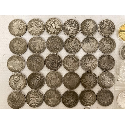 380 - A BAG CONTAINING THIRTY USA ONE DOLLAR COINS, MANY BEING 19TH CENTURY, KENNEDY HALF DOLLAR 1965 WITH... 