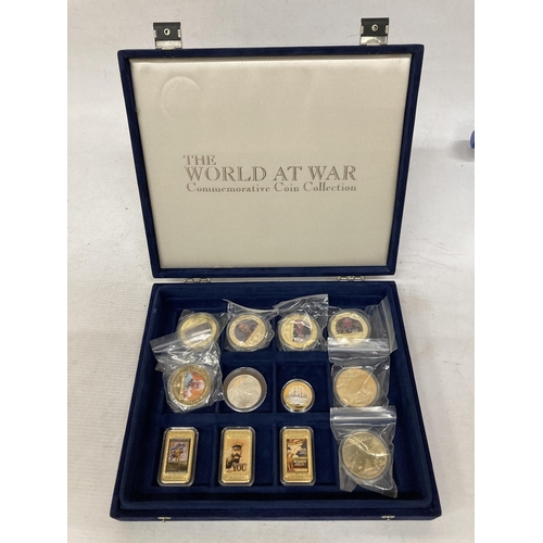 389 - A COLLECTION OF THE WORLD AT WAR COMMEMORATIVE COIN COLLECTION IN PRESENTATION BOX TO INCLUDE POSTER... 