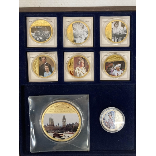 390 - A CASED COLLECTION OF COMMEMORATIVE COINS TO INCLUDE A 2012 DIAMOND JUBILEE GOLD PLATED COIN WITH CO... 