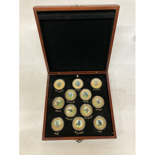 391 - A CASED BOX OF DANBURY MINT RACING LEGENDS MEDALLION COINS 22CT GOLD PLATED BY GRAHAM ISOM