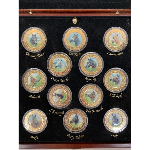 391 - A CASED BOX OF DANBURY MINT RACING LEGENDS MEDALLION COINS 22CT GOLD PLATED BY GRAHAM ISOM