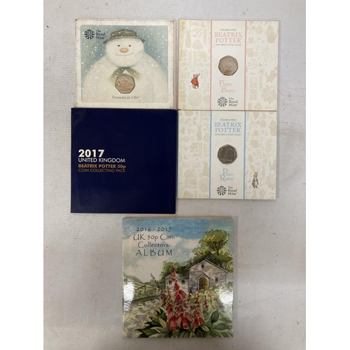 392 - A COLLECTION OF COLLECTOR'S FIFTY PENCE COIN PACKAGES TO INCLUDE ROYAL MINT BEATRIX POTTER PETER RAB... 