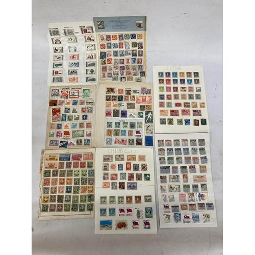 484 - TEN PAGES OF CHINESE STAMPS