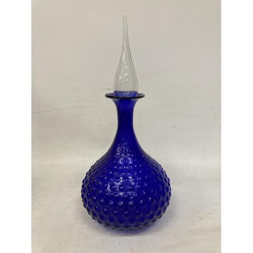 18 - AN EPOLI YELLOW MOON AND STARS GLASS GENIE BOTTLE TOGETHER WITH A BUBBLE DECANTER BOTTLE IN COBALT B... 