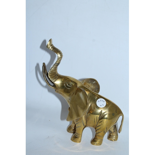 122 - A LARGE BRASS ELEPHANT