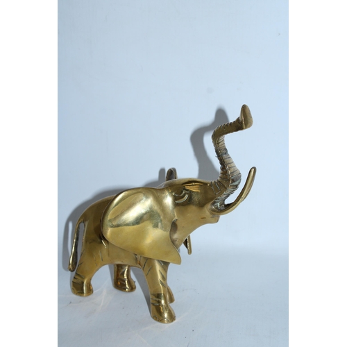 122 - A LARGE BRASS ELEPHANT