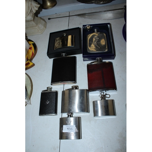 135 - A COLLECTION OF HIP FLASKS