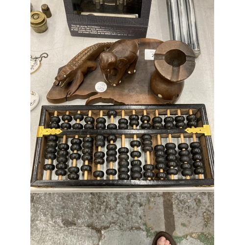 203 - A BRASS AND WOODEN ABACUS AND A VINTAGE WOODEN CROCODILE AND ELEPHANT ASHTRAY