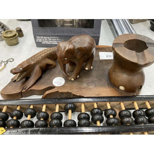 203 - A BRASS AND WOODEN ABACUS AND A VINTAGE WOODEN CROCODILE AND ELEPHANT ASHTRAY