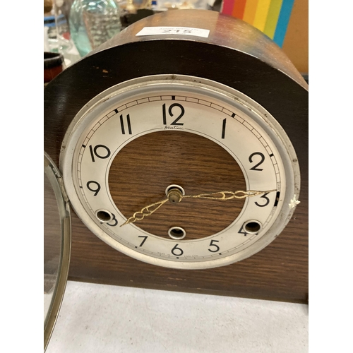 215 - A VINTAGE OAK CASED BENTIMA WESTMINSTER CHIMING MANTLE CLOCK WITH PENDULUM AND KEY