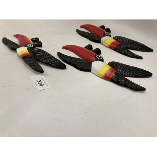 230 - THREE GRADUATED HEAVY CAST GUINNESS TOUCANS - LARGEST 26CM