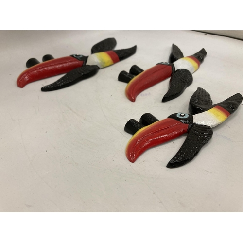 230 - THREE GRADUATED HEAVY CAST GUINNESS TOUCANS - LARGEST 26CM