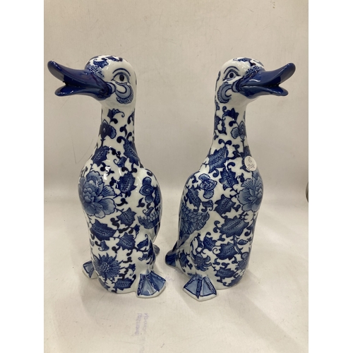 236 - TWO BLUE AND WHITE CERAMIC DUCKS, HEIGHT 30CM