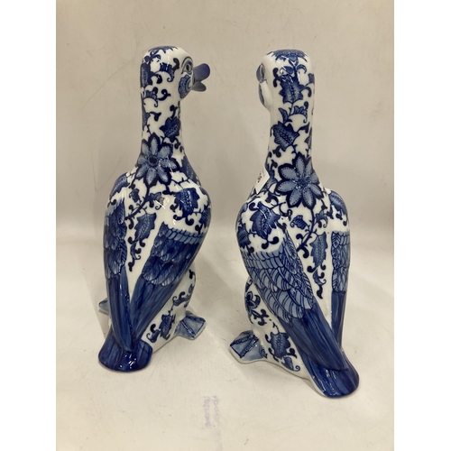 236 - TWO BLUE AND WHITE CERAMIC DUCKS, HEIGHT 30CM