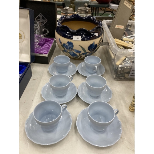 243 - A LARGE VINTAGE LOVATT'S LANGLEY WARE BLUE AND CREAM BOWL WITH FLUTED EDGE AND TUBELINED FLORAL DECO... 