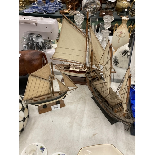 246 - THREE VINTAGE WOODEN MODELS OF BOATS