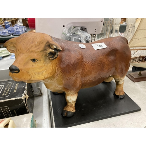 248 - A LARGE BUTCHERS SHOP WINDOW, BULL ON A STAND, HEIGHT 22CM, LENGTH 35CM