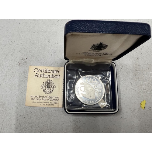 445 - A SEYCHELLES 1976 TEN RUPEES SILVER COIN. BOXED WITH COA